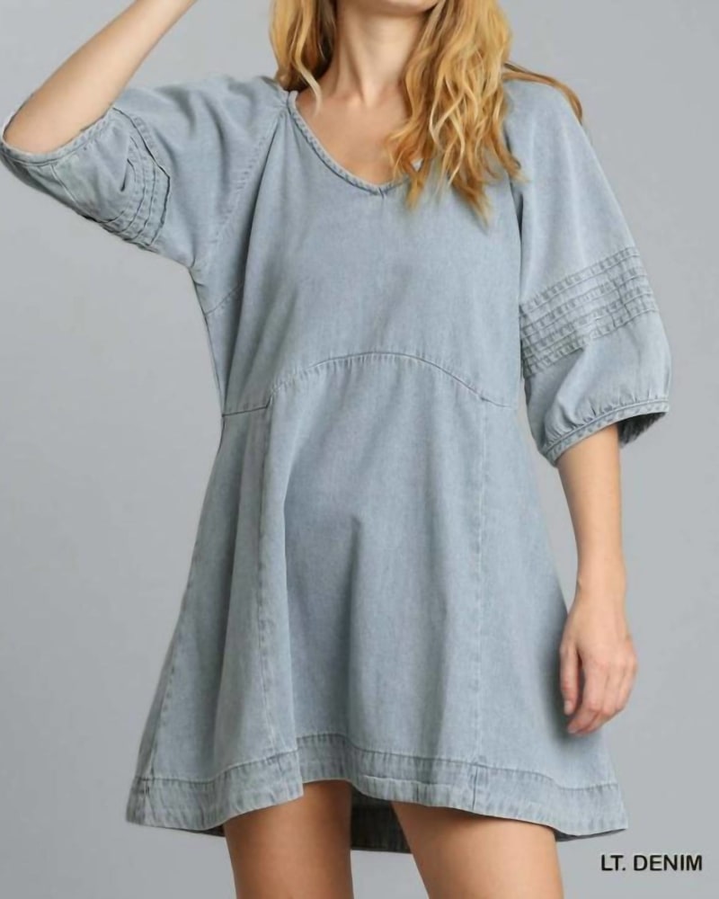 Front of a model wearing a size L Half Puff Sleeve Dress In Light Denim in Light Denim by Umgee. | dia_product_style_image_id:346852